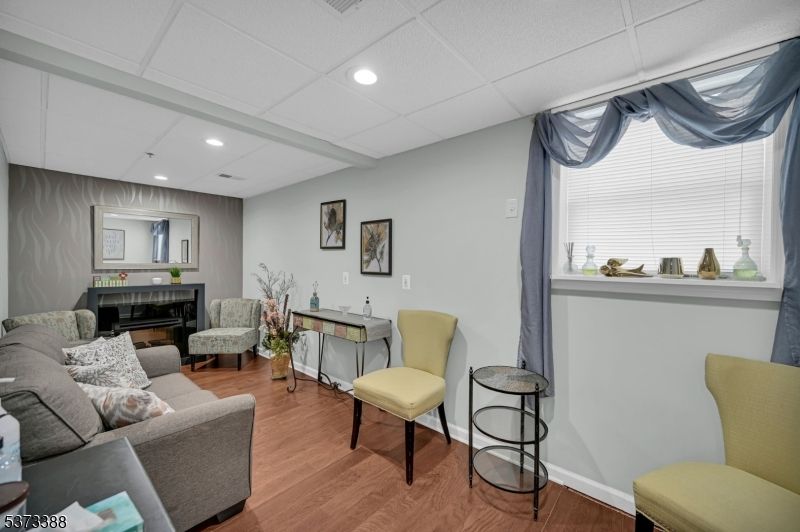 Fireplace, Interior, Living room, Recessed Lighting, Wood Texture Flooring