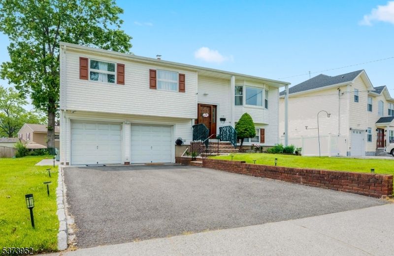 Attached, Exterior, Facade, Raised Ranch