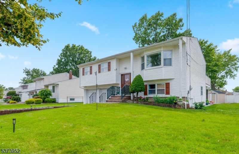 Attached, Backyard, Exterior, Facade, Raised Ranch