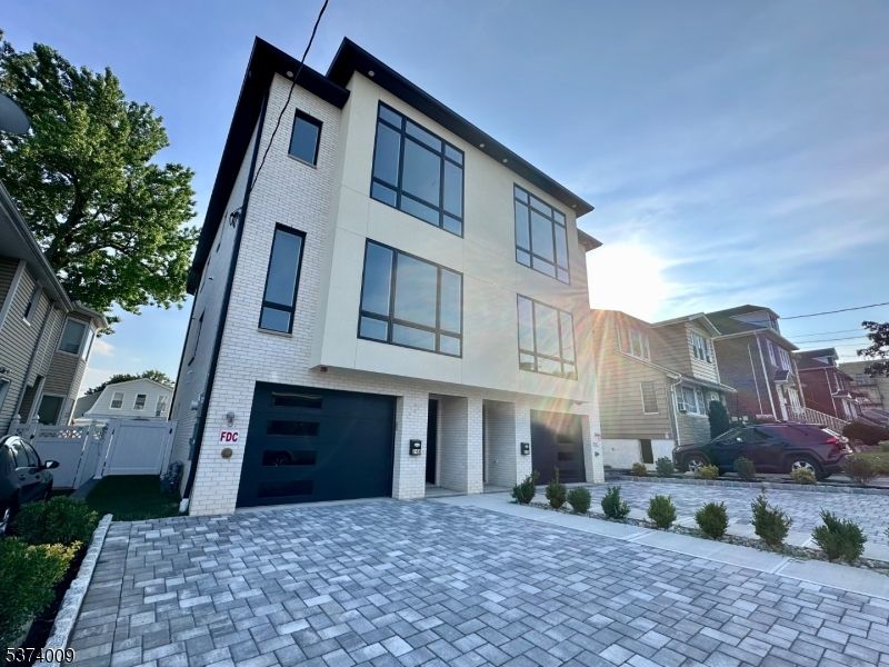 Attached, Exterior, Facade, Brick Facade, Modern