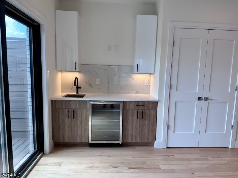Interior, Kitchen, Marble Walls, Stainless Steel Appliances, Wood Texture Flooring