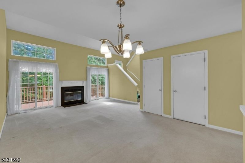 Chandelier, Empty room, Fireplace, Interior