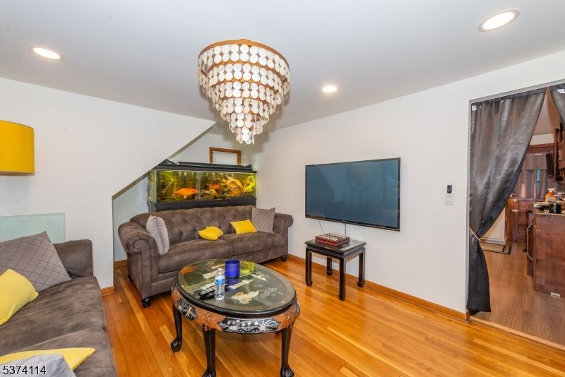 Chandelier, Interior, Living room, Recessed Lighting, Wood Texture Flooring