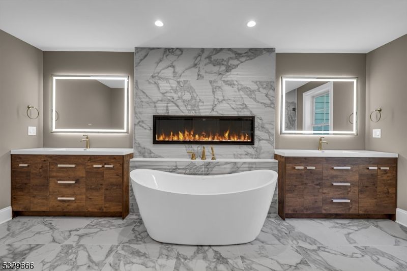 Bathroom, Dual Sink Vanities, Fireplace, Free Standing Baths, Interior, Marble, Marble Walls, Recessed Lighting