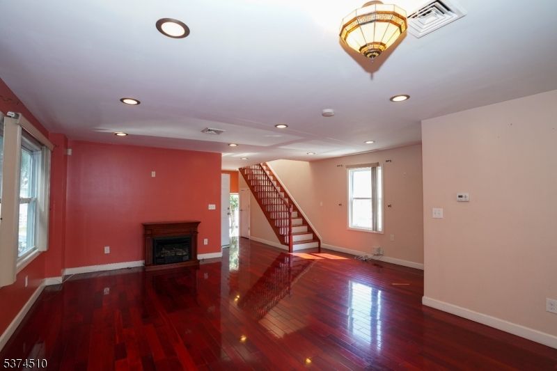 Empty room, Fireplace, Interior, Recessed Lighting, Wood Texture Flooring