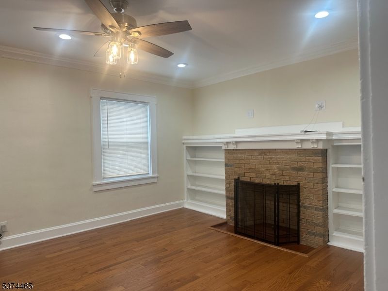 Empty room, Fireplace, Interior, Recessed Lighting, Wood Texture Flooring