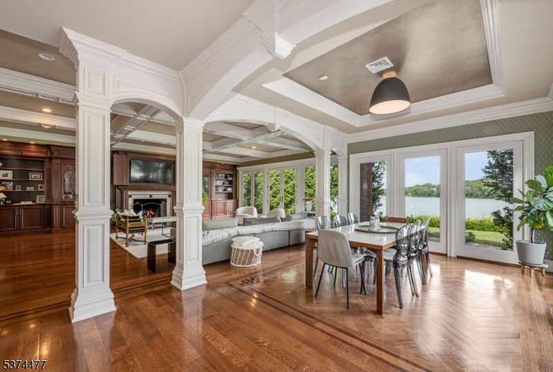 Dining room, Fireplace, Interior, Living room, Recessed Lighting, Wood Texture Flooring