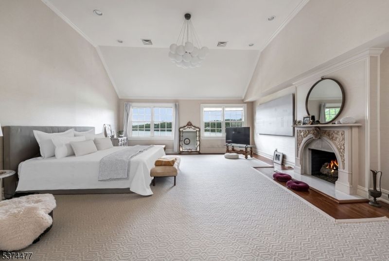 Bedroom, Chandelier, Fireplace, Interior, Recessed Lighting, Wood Texture Flooring