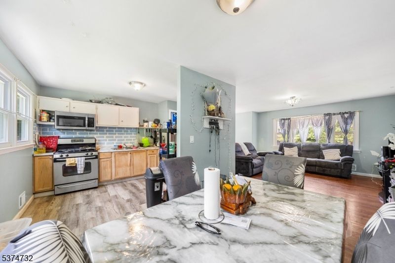 Dining room, Interior, Kitchen, Living room, Stainless Steel Appliances, Wood Texture Flooring