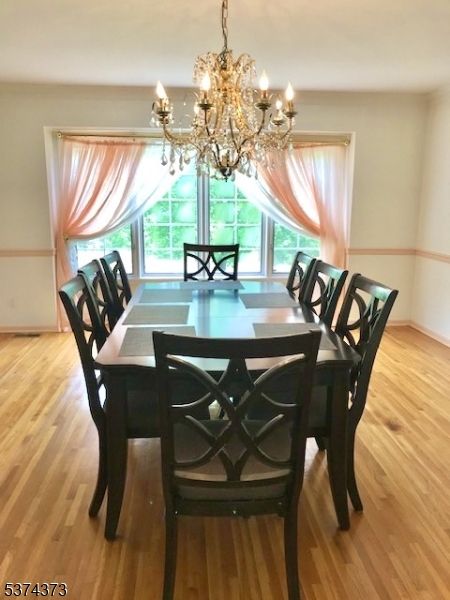 Chandelier, Dining room, Interior, Wood Texture Flooring