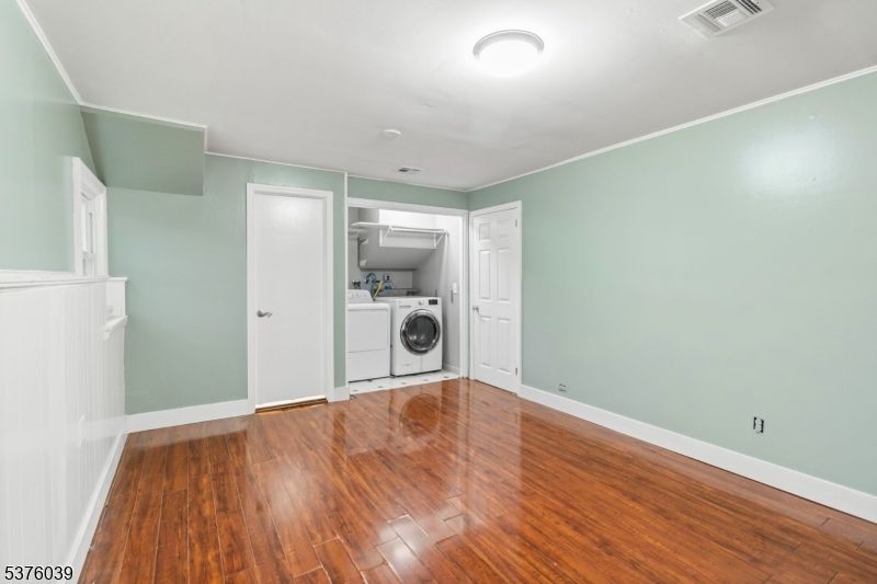 Empty room, Interior, Utility Closets, Washer, Wood Texture Flooring