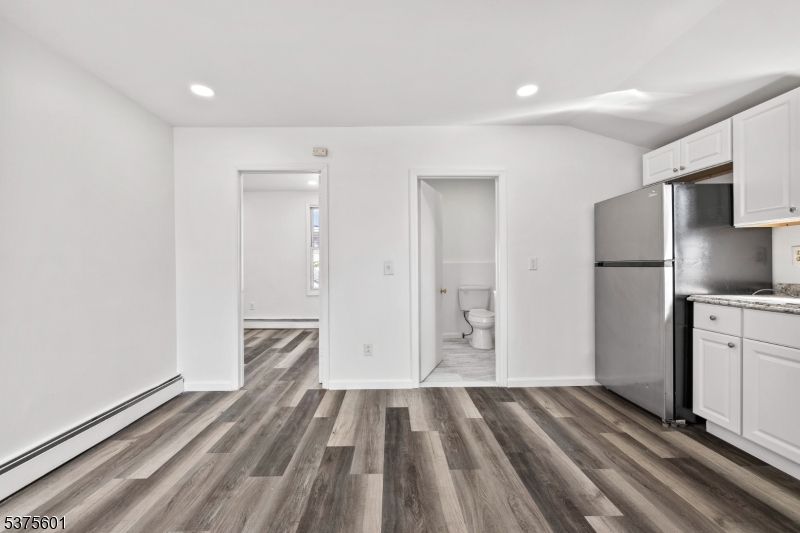 Bathroom, Empty room, Interior, Kitchen, Recessed Lighting, Wood Texture Flooring