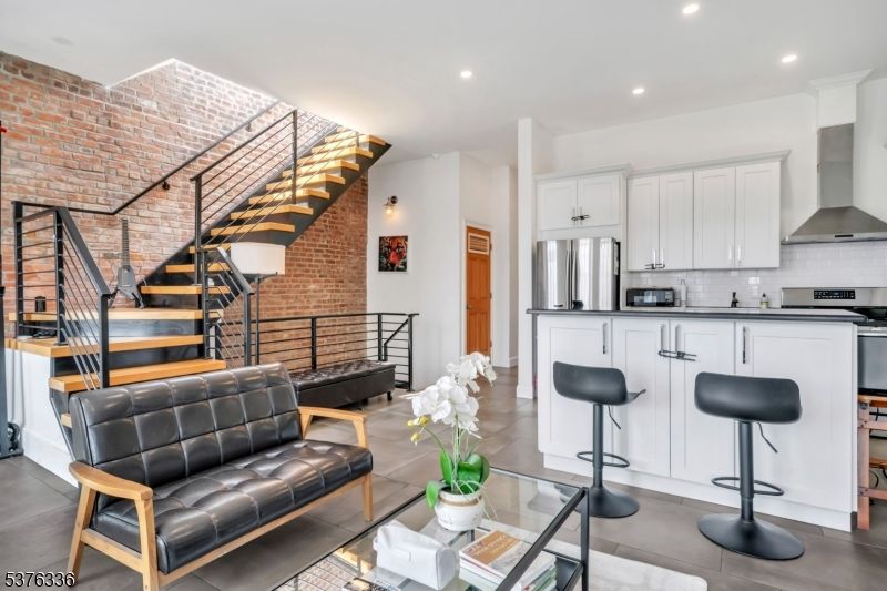 Interior, Kitchen, Living room, Recessed Lighting, Stainless Steel Appliances, Stone Walls