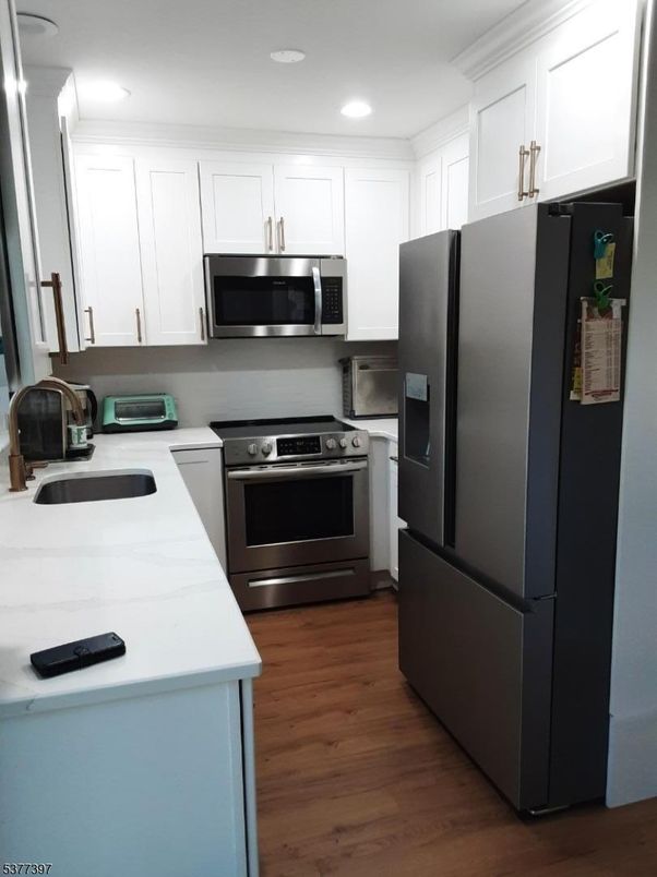 Interior, Kitchen, Recessed Lighting, Stainless Steel Appliances, Wood Texture Flooring
