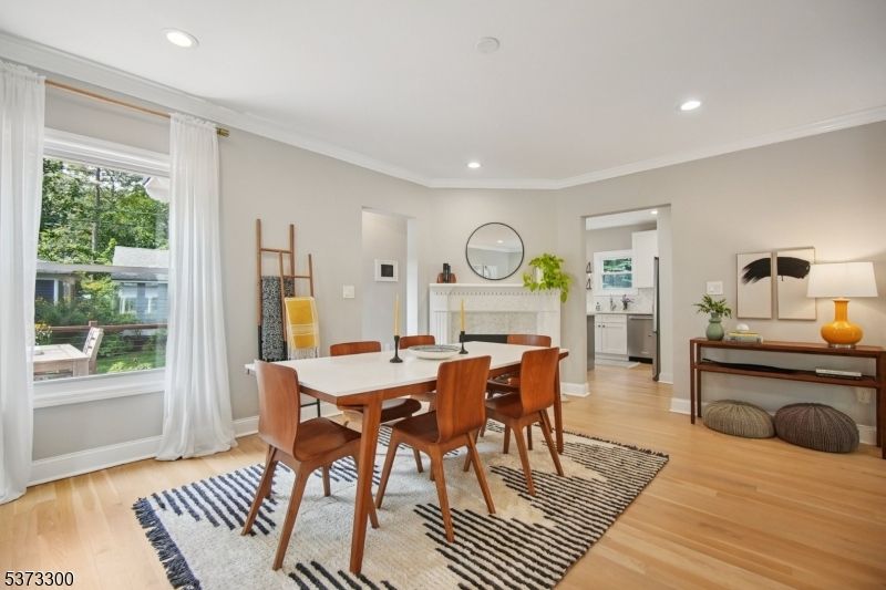 Dining room, Fireplace, Interior, Recessed Lighting, Wood Texture Flooring