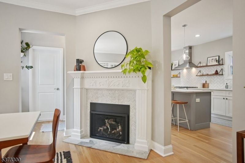 Fireplace, Interior, Kitchen, Pendant Lights, Recessed Lighting, Wood Texture Flooring