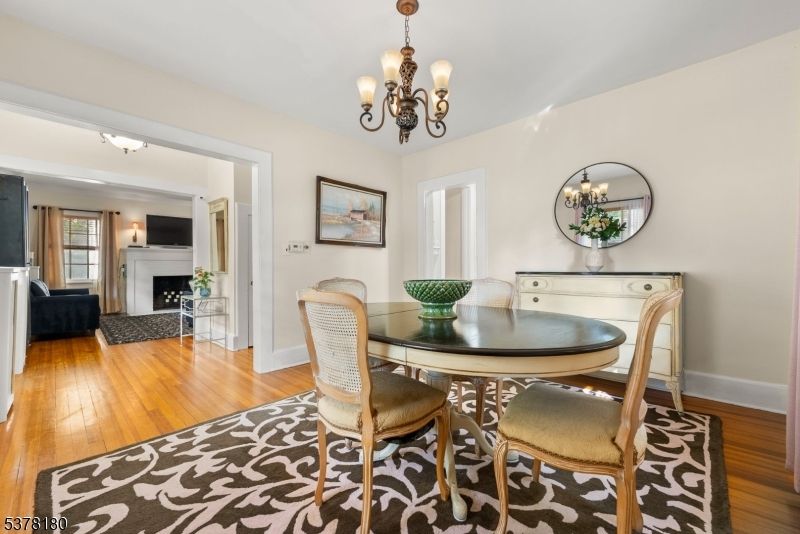 Chandelier, Dining room, Fireplace, Interior, Wood Texture Flooring