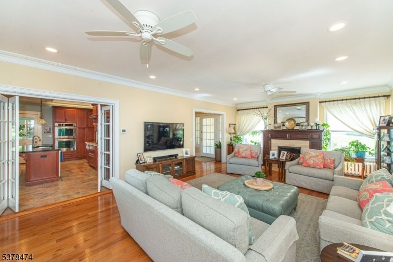 Fireplace, Interior, Kitchen, Living room, Recessed Lighting, Wood Texture Flooring