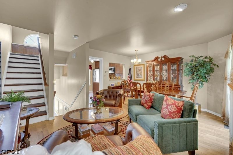 Chandelier, Dining room, Interior, Living room, Recessed Lighting, Wood Texture Flooring