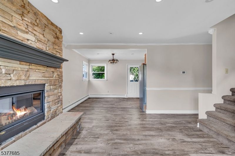 Fireplace, Interior, Recessed Lighting, Wood Texture Flooring