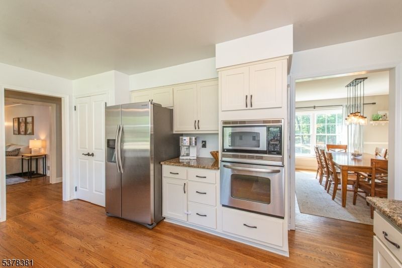 Dining room, Interior, Kitchen, Pendant Lights, Stainless Steel Appliances, Wood Texture Flooring