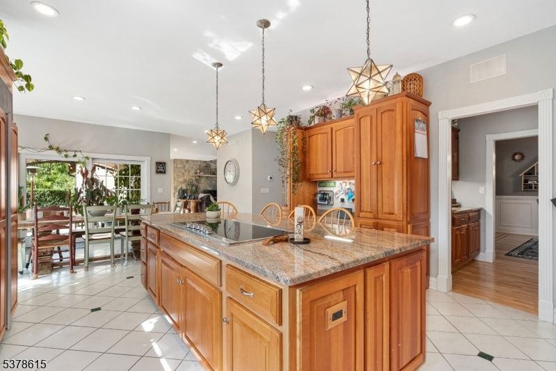 Dining room, Fireplace, Interior, Kitchen, Pendant Lights, Recessed Lighting, Wood Texture Flooring