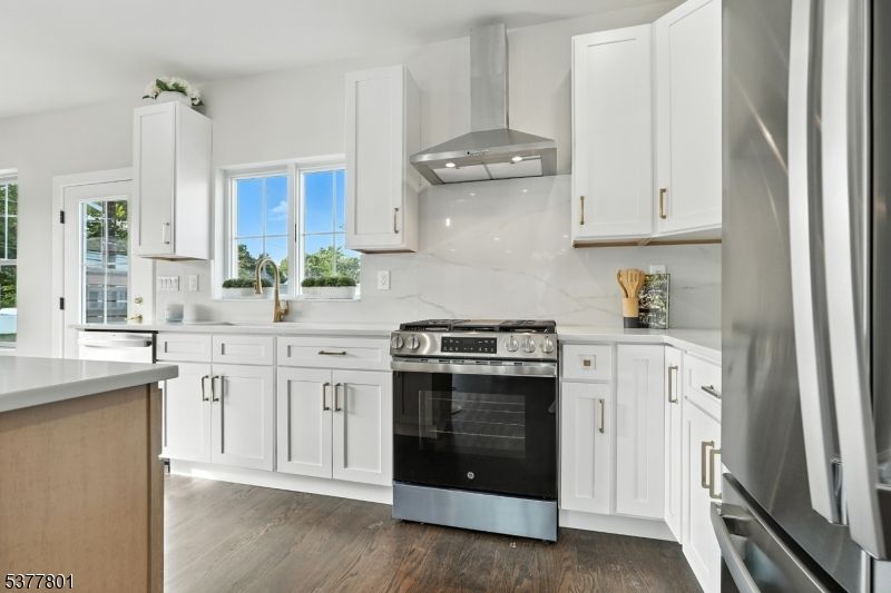 Interior, Kitchen, Marble Walls, Recessed Lighting, Stainless Steel Appliances, Wood Texture Flooring