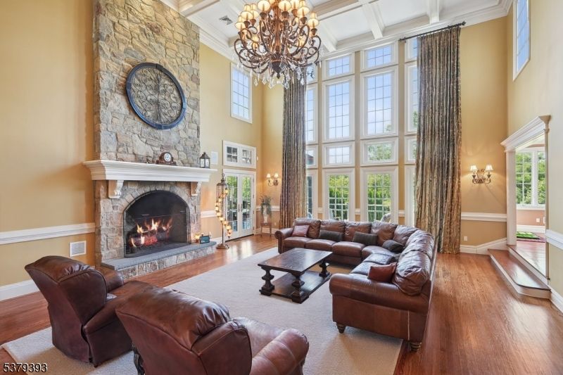 Chandelier, Fireplace, Interior, Living room, Stone Walls, Wood Texture Flooring