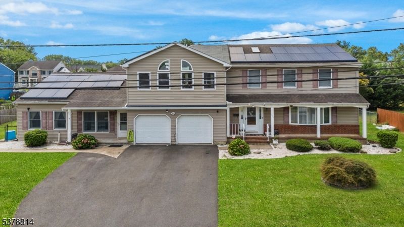 Attached, Exterior, Facade, Solar Panels, Split Level