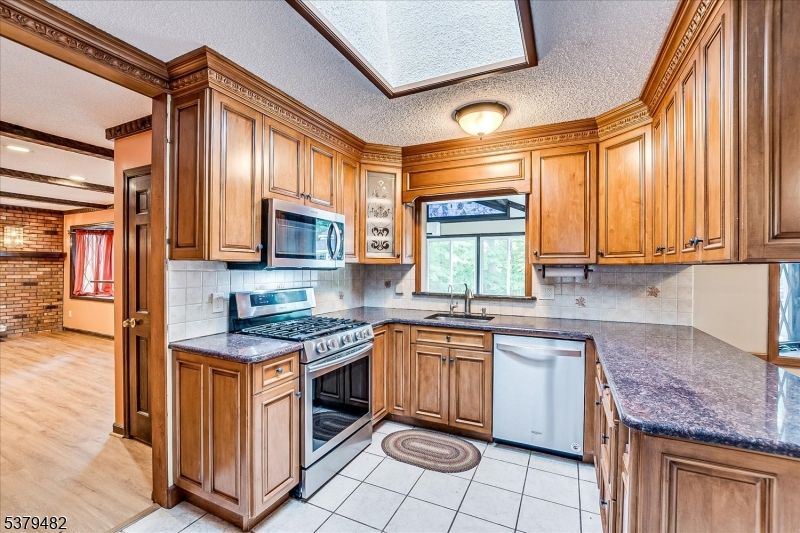 Interior, Kitchen, Recessed Lighting, Stone Walls, Wood Texture Flooring