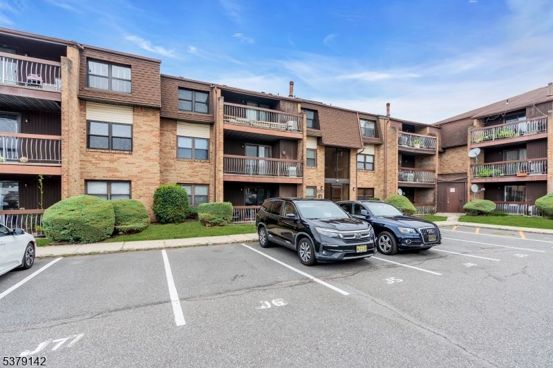 Exterior, Facade, Brick Facade, Condo Building