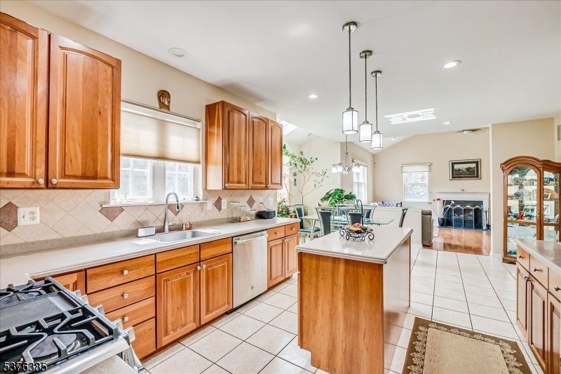 Dining room, Fireplace, Interior, Kitchen, Pendant Lights, Recessed Lighting, Stainless Steel Appliances