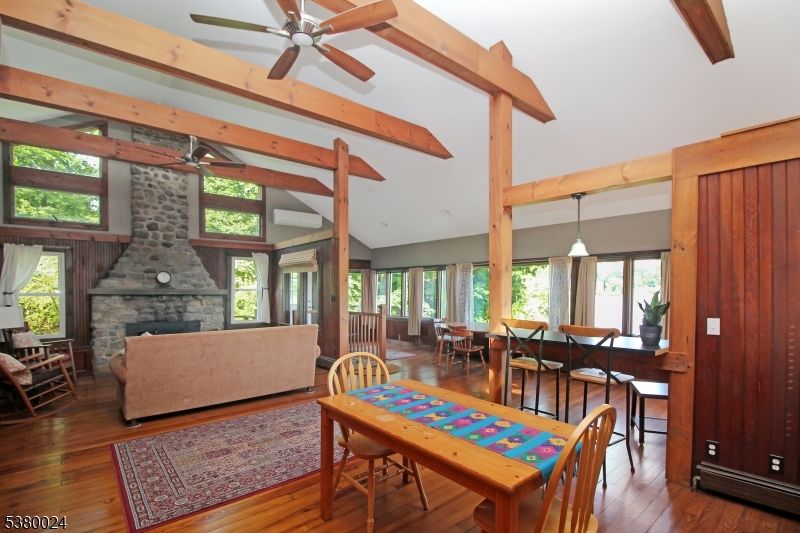 Dining room, Fireplace, Interior, Living room, Pendant Lights, Wooden Beams, Wood Texture Flooring