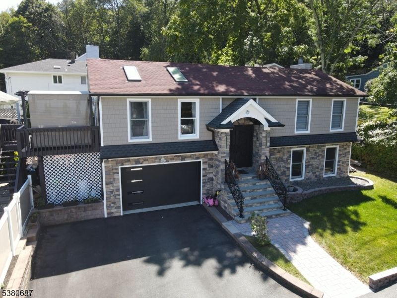 Attached, Exterior, Facade, Raised Ranch