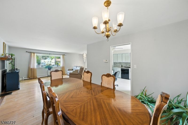 Chandelier, Dining room, Fireplace, Interior, Wood Texture Flooring
