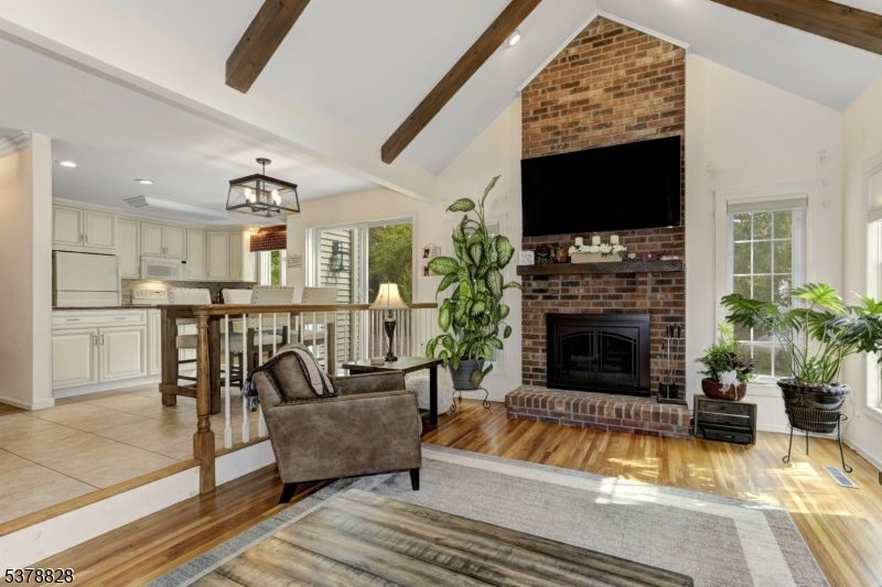 Dining room, Fireplace, Interior, Kitchen, Living room, Recessed Lighting, Stone Walls, Wooden Beams, Wood Texture Flooring