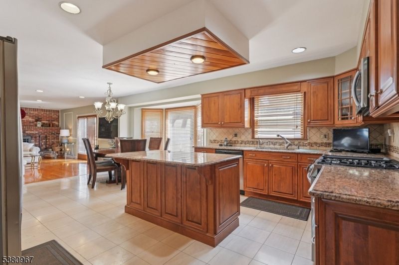 Chandelier, Dining room, Interior, Kitchen, Living room, Recessed Lighting, Wooden Ceilings