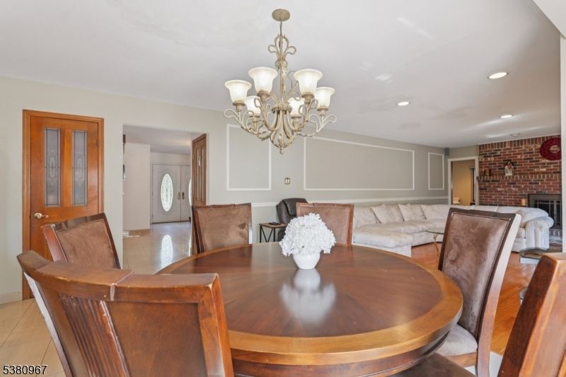 Chandelier, Dining room, Fireplace, Interior, Recessed Lighting, Stone Walls