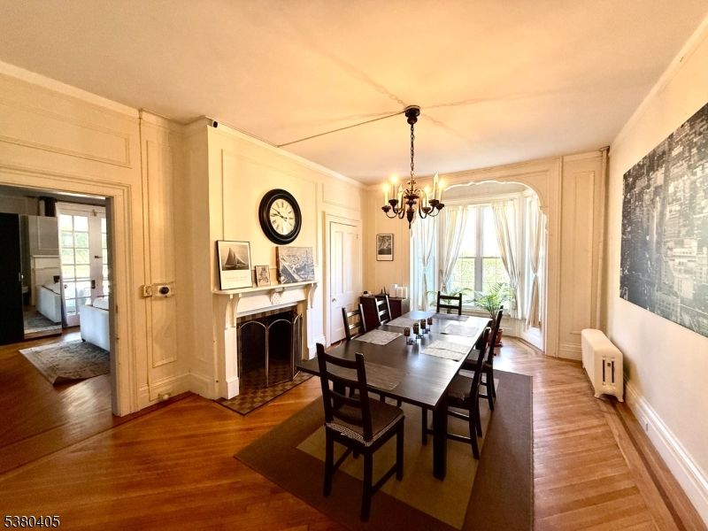 Chandelier, Dining room, Fireplace, Interior, Wood Texture Flooring