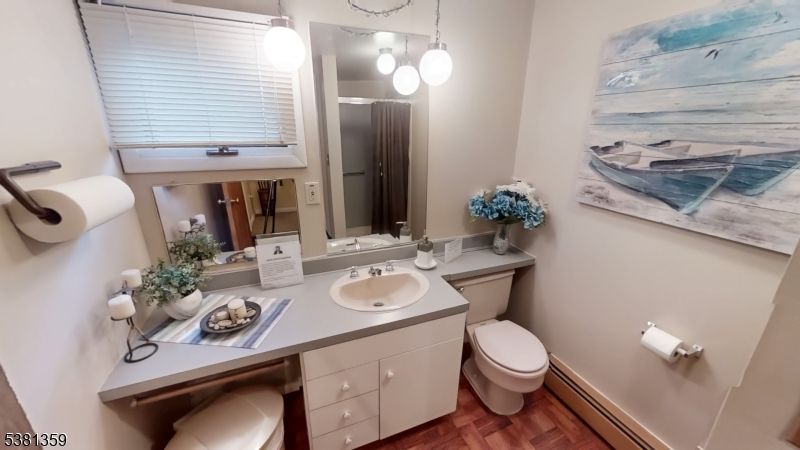 Bathroom, Dual Sink Vanities, Interior, Pendant Lights, Wood Texture Flooring