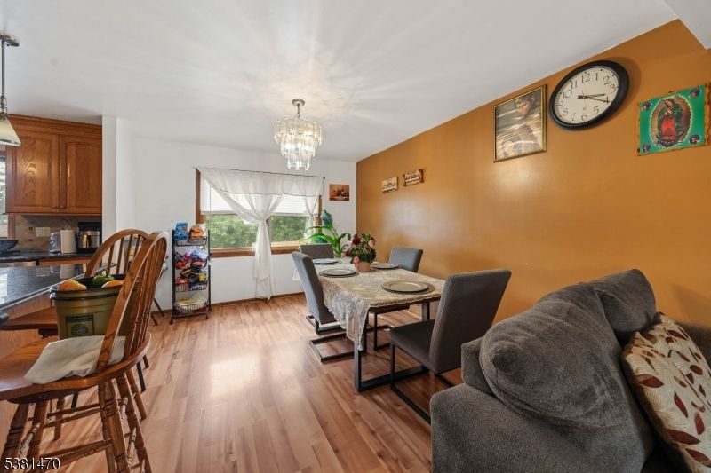 Chandelier, Dining room, Interior, Wood Texture Flooring