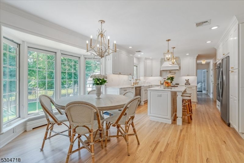Chandelier, Dining room, Interior, Kitchen, Pendant Lights, Recessed Lighting, Wood Texture Flooring
