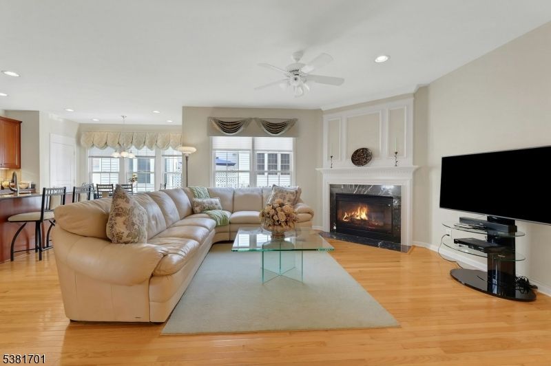 Dining room, Fireplace, Interior, Living room, Pendant Lights, Recessed Lighting, Wood Texture Flooring