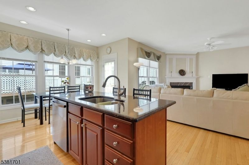 Dining room, Fireplace, Interior, Kitchen, Living room, Pendant Lights, Recessed Lighting, Wood Texture Flooring
