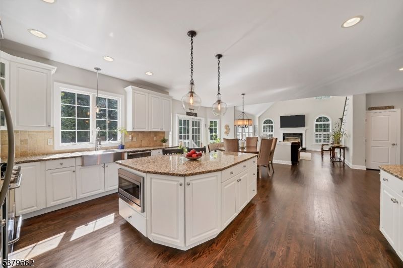 Dining room, Fireplace, Interior, Kitchen, Living room, Pendant Lights, Recessed Lighting, Wood Texture Flooring