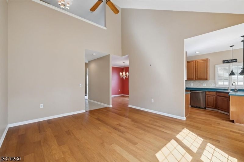 Chandelier, Empty room, Interior, Kitchen, Pendant Lights, Recessed Lighting, Wood Texture Flooring