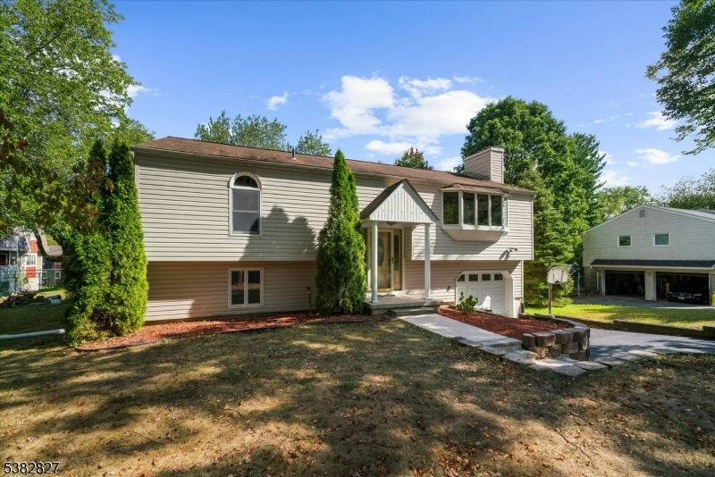 Attached, Backyard, Exterior, Facade, Raised Ranch