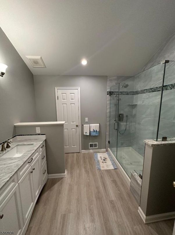 Bathroom, Glass Shower, Interior, Recessed Lighting, Wood Texture Flooring