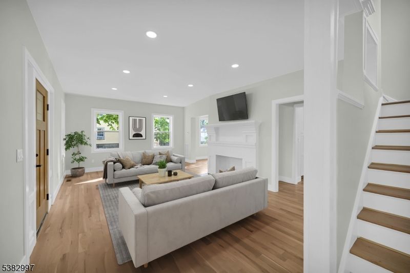 Fireplace, Interior, Living room, Recessed Lighting, Wood Texture Flooring