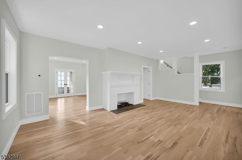 Empty room, Fireplace, Interior, Recessed Lighting, Wood Texture Flooring